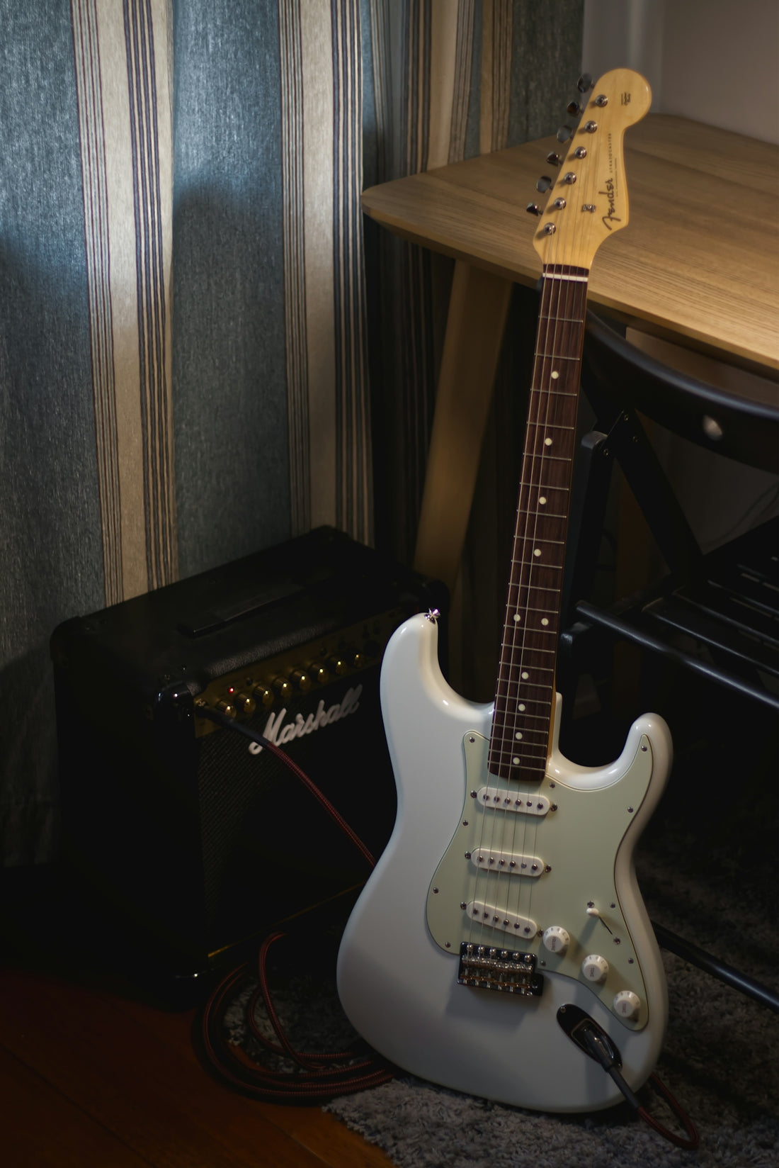 black and white stratocaster electric guitar