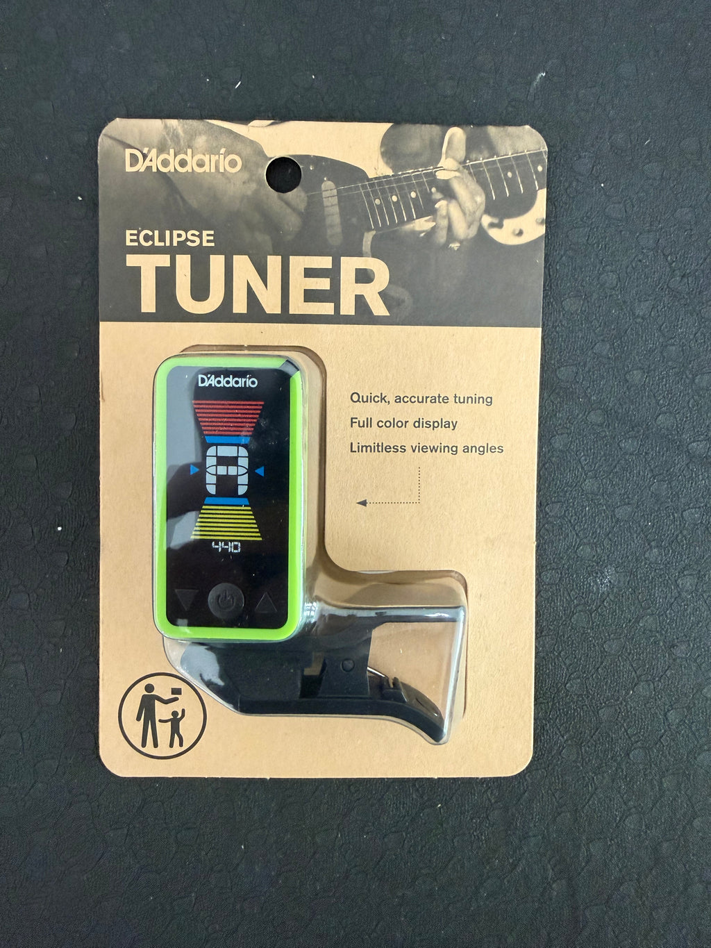 D'Addario Eclipse Headstock Tuner by Palm Harbor Music, mounted on guitar headstock showing tuning display and controls.