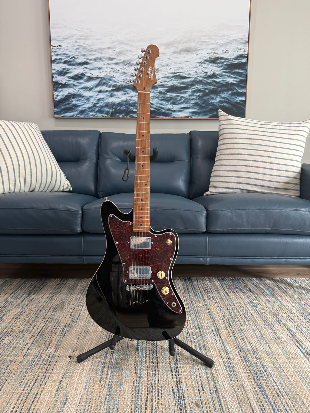 Palm Harbor Music JET JJ-350 BK electric guitar with black finish, showcasing its sleek body and hardware details.