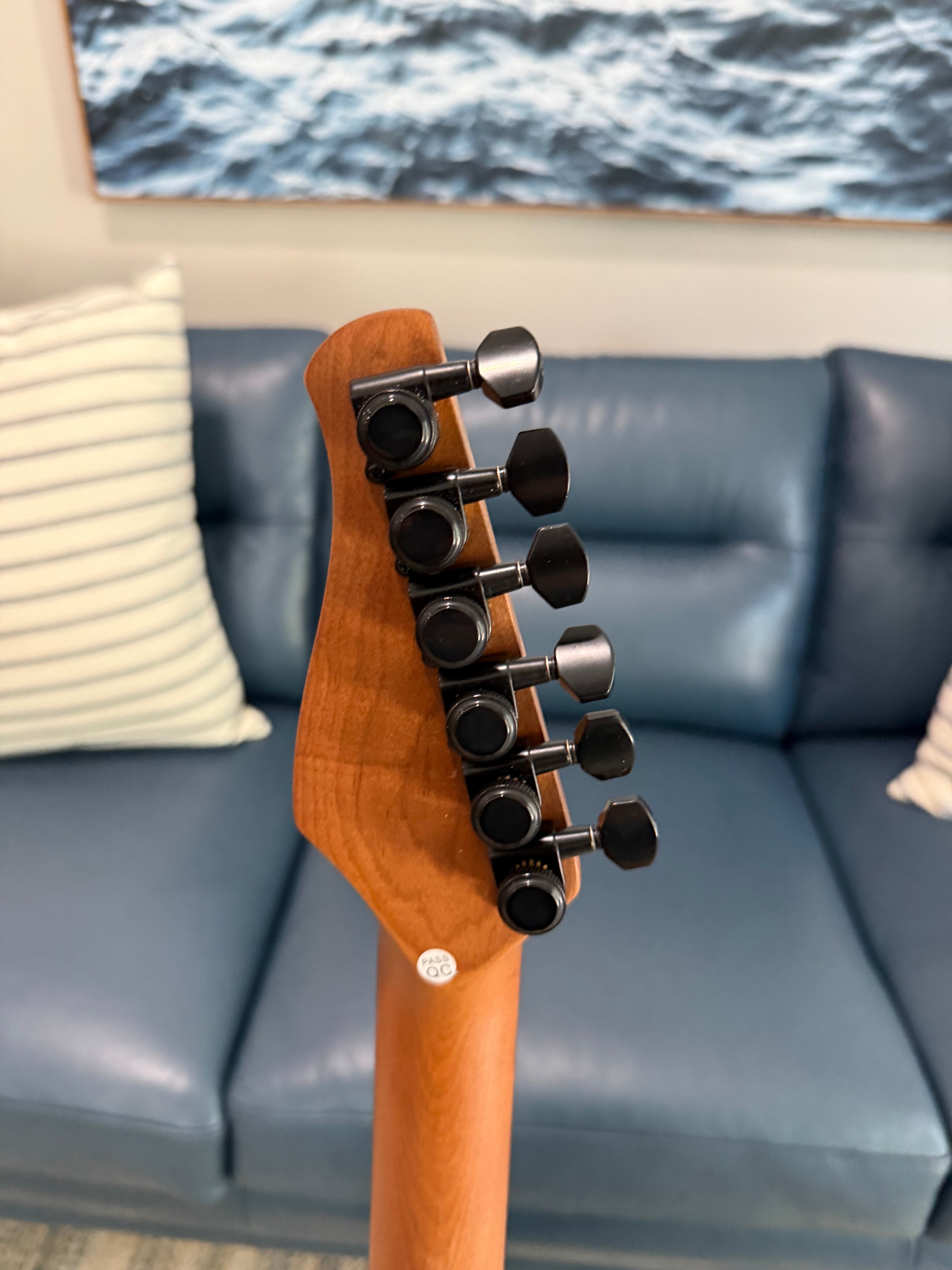 Cerberus Hermes 6HT baritone guitar with granite sparkle finish, showcasing its sleek design and polished hardware.