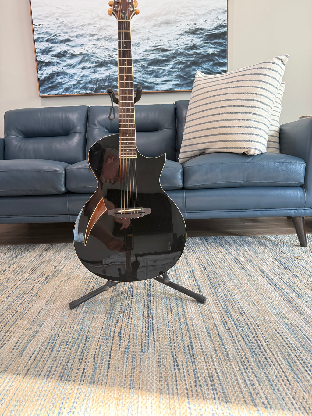 Black 2017 ESP LTD TL-6 electric guitar with rosewood fretboard and gig bag, showing the body and neck details.