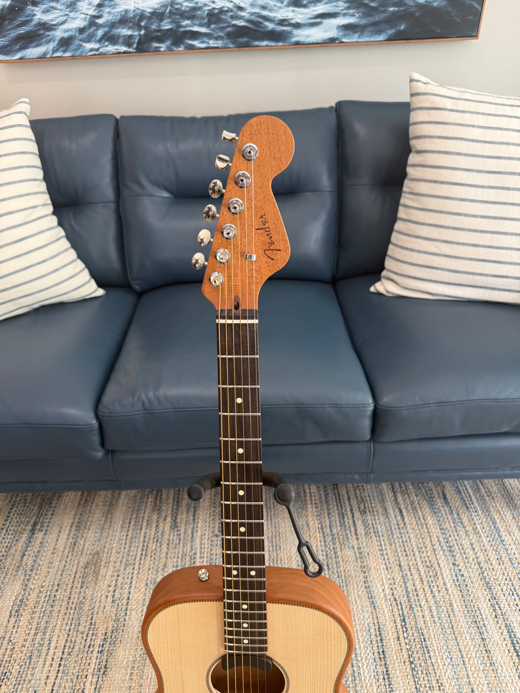 Used Fender Highway Series dreadnought acoustic-electric guitar with a mint finish, showcasing the natural wood body and detailed fretboard.