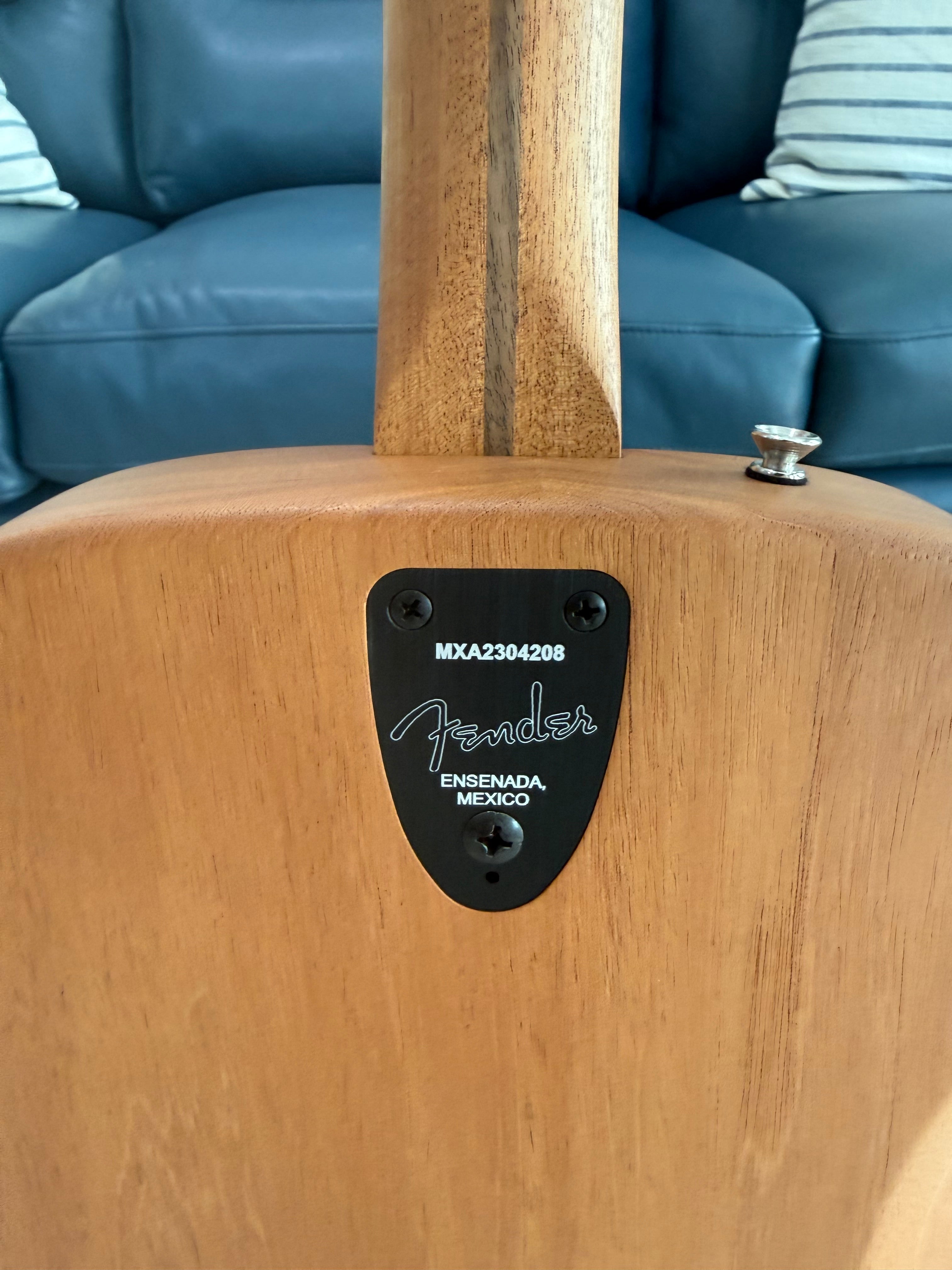Used Fender Highway Series dreadnought acoustic electric guitar with a mint finish, showcasing a natural wood body and pickguard.