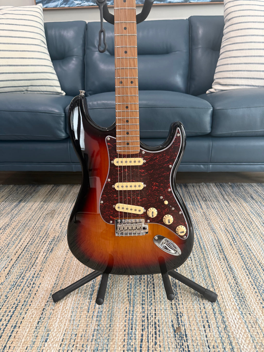 Palm Harbor Music JET JS-300 SB electric guitar with sunburst finish and chrome hardware, close-up of body and strings.