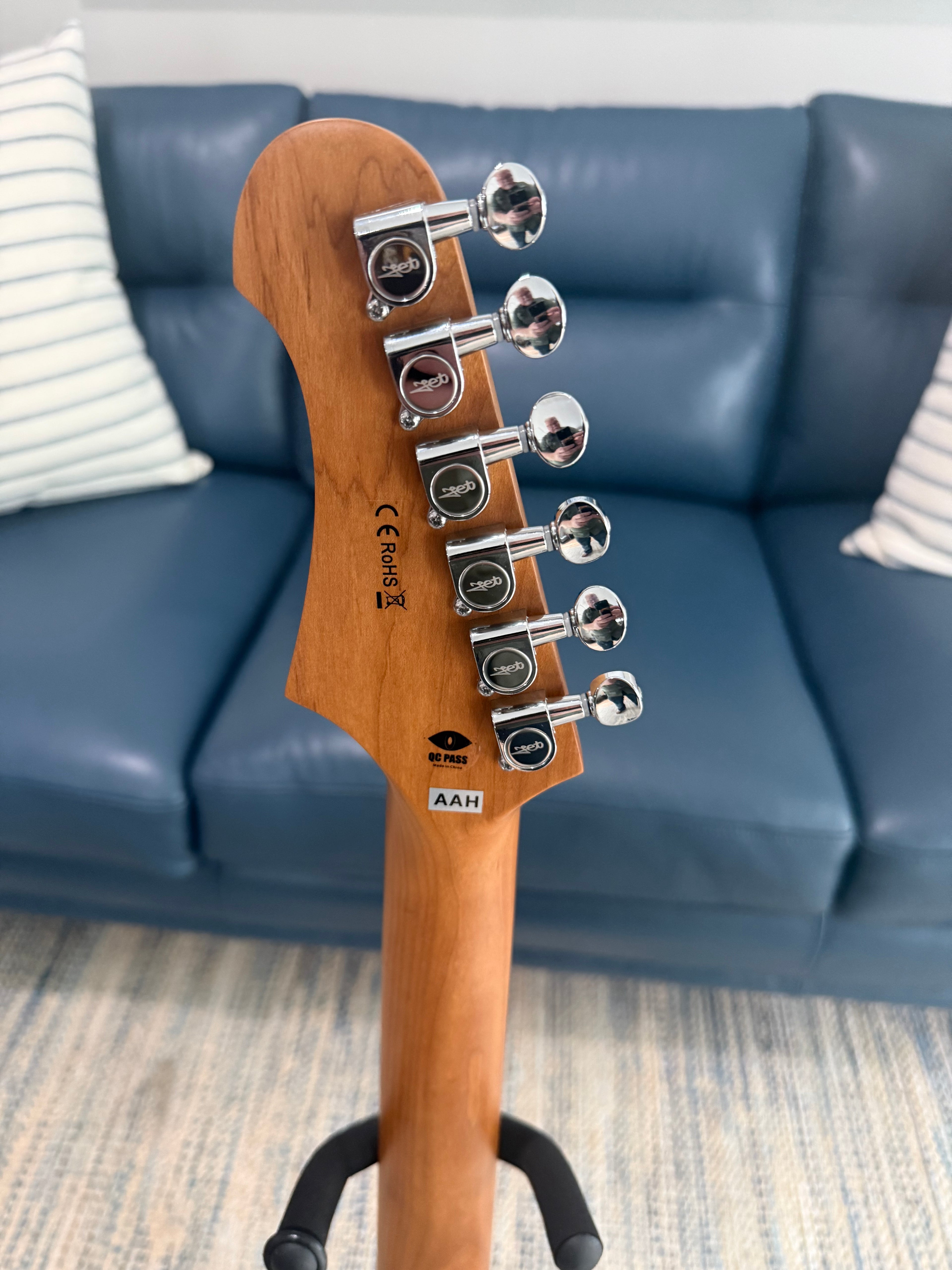 Palm Harbor Music JET JS-300 SB electric guitar with sunburst finish, showcasing its sleek body and six-string design.