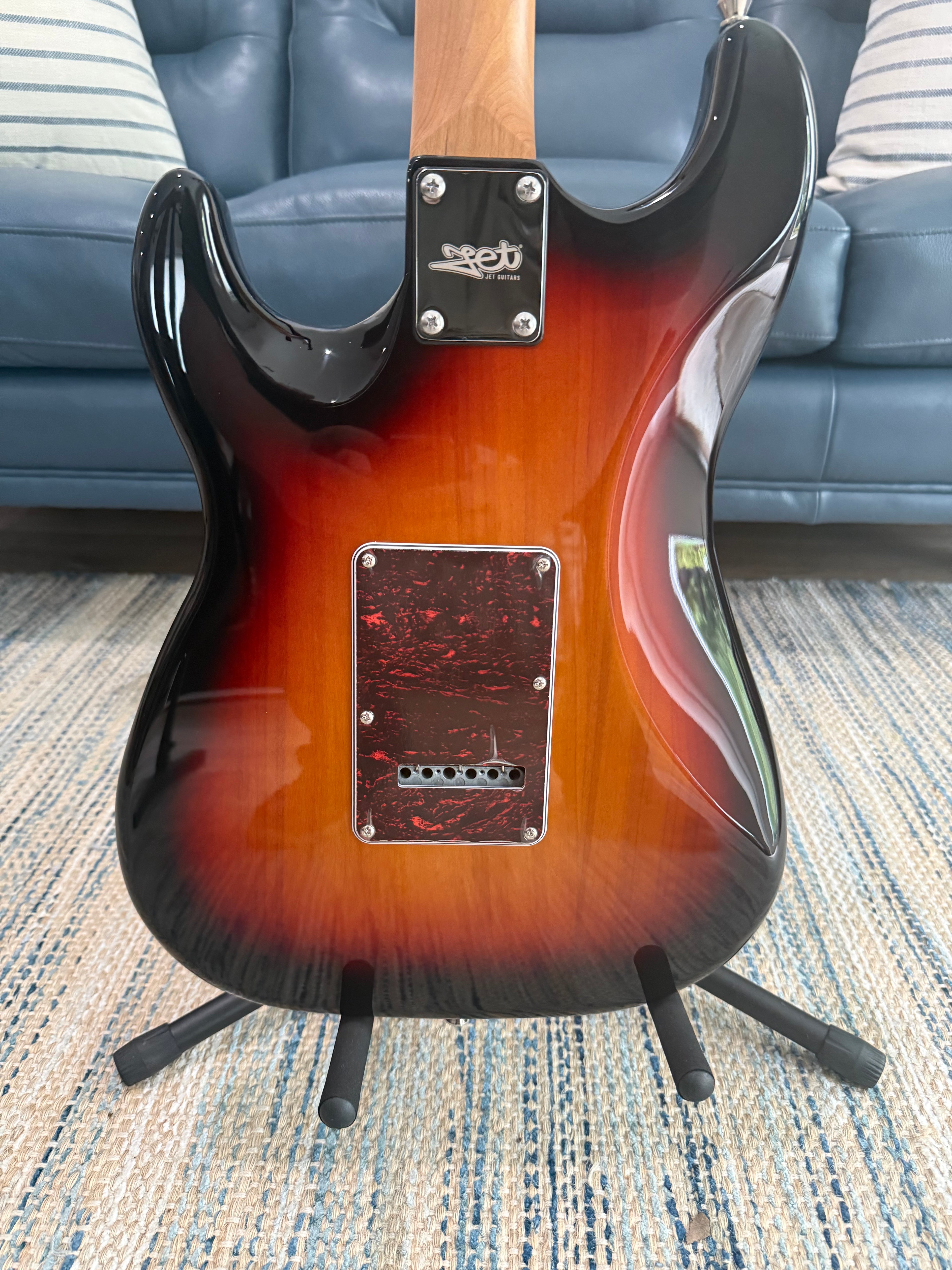 Palm Harbor Music JET JS-300 SB electric guitar, sleek black finish, body shape, and detailed hardware visible in the image.