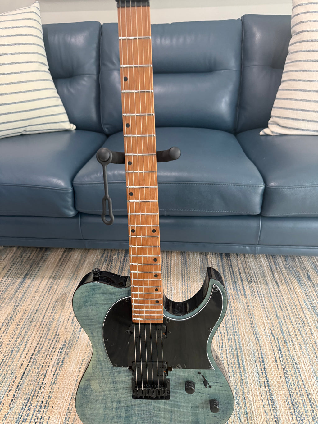 Palm Harbor Music Spira T-450 TDB electric guitar with sunburst finish and double-cutaway body, shown in close-up.