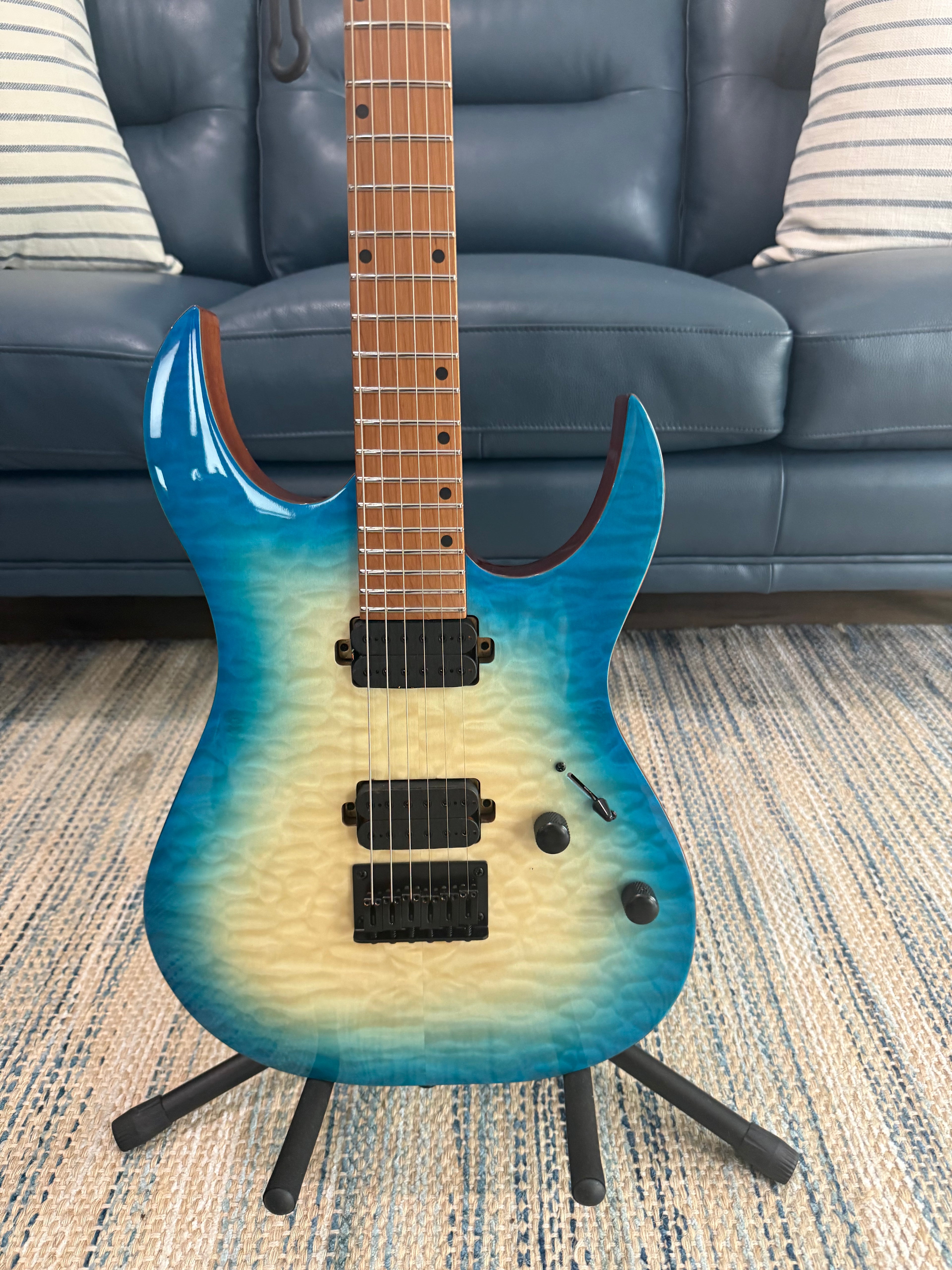 Palm Harbor Music Spira S-500 QAB acoustic guitar with natural wood finish, body and neck detail visible in the image.