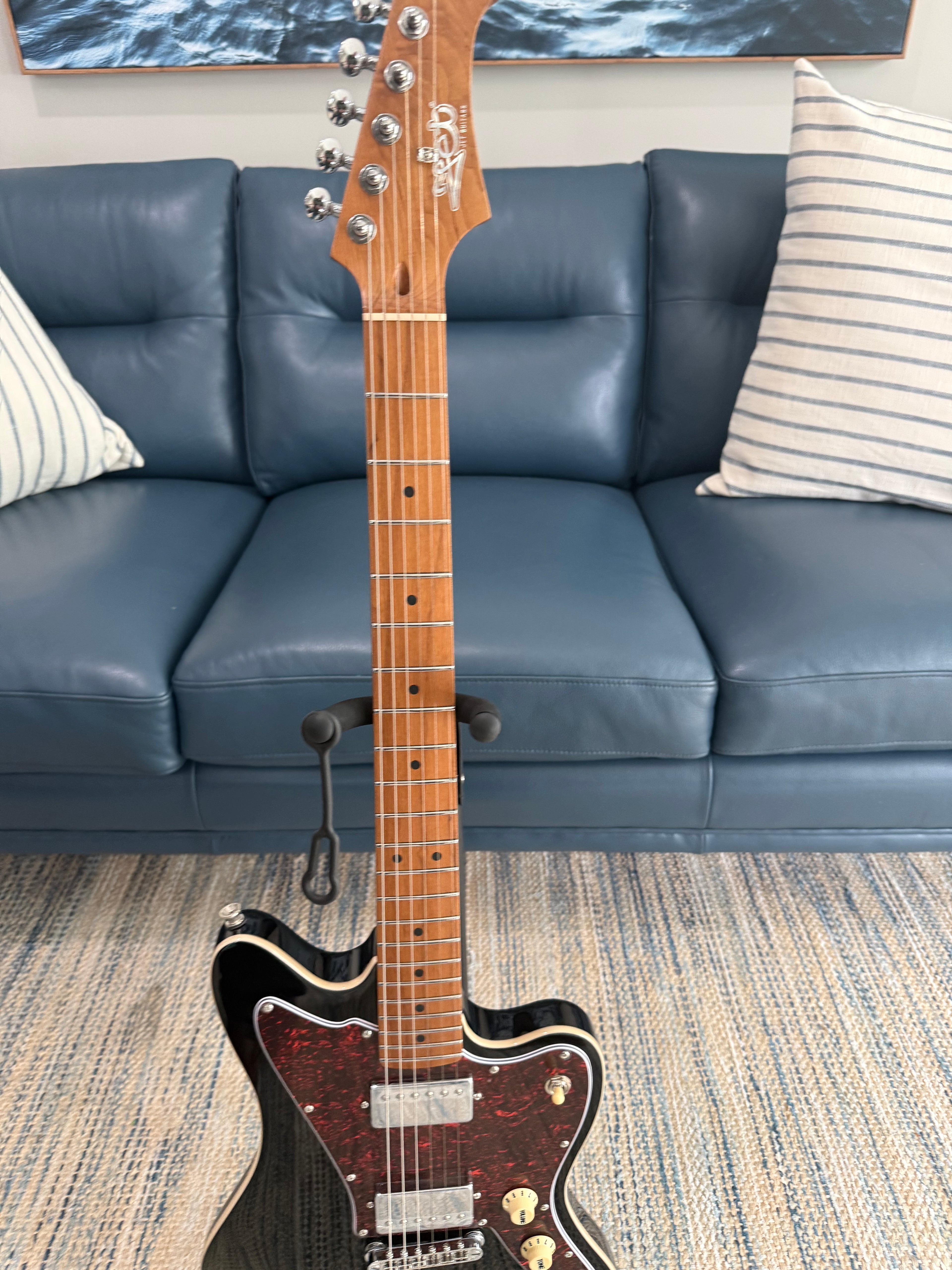 Palm Harbor Music JET JJ-350 BK electric guitar with black finish, showcasing its sleek body and hardware details.