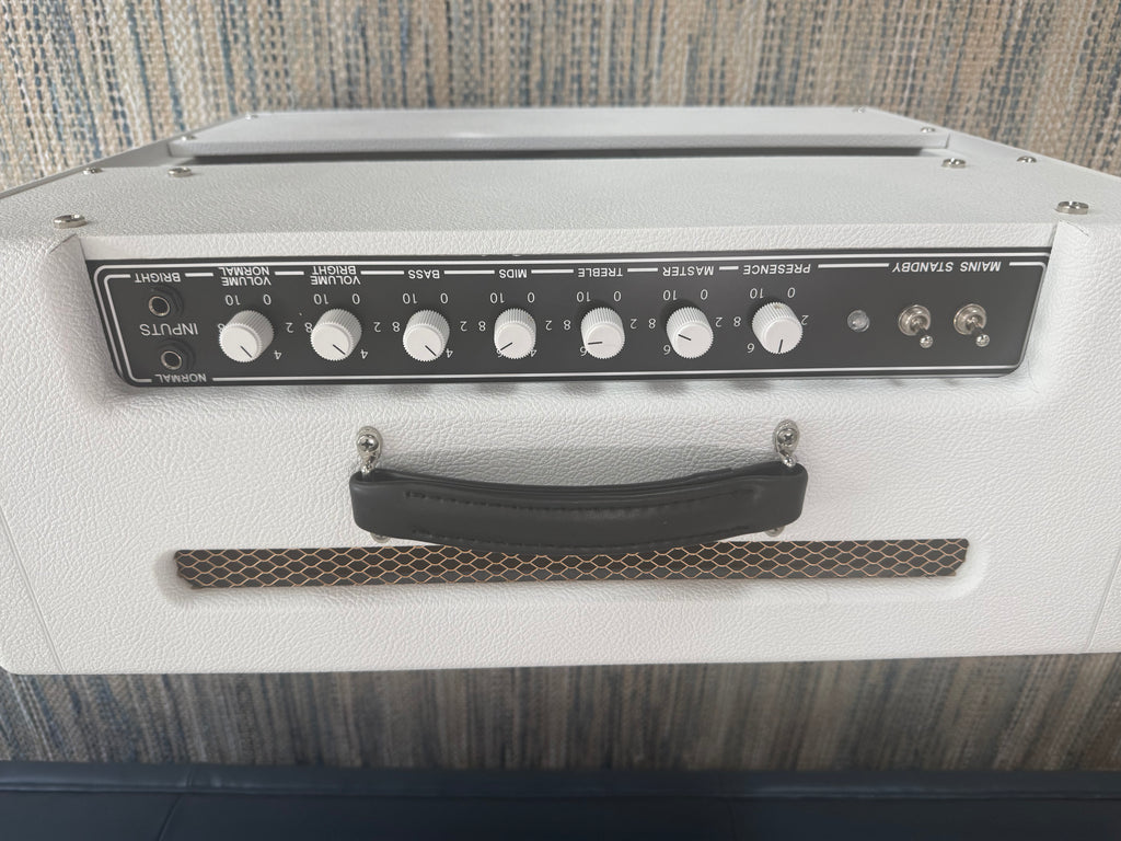 White Sand 45 Amp by Palm Harbor Music with a sleek design and vibrant color, showcasing its front panel and controls.