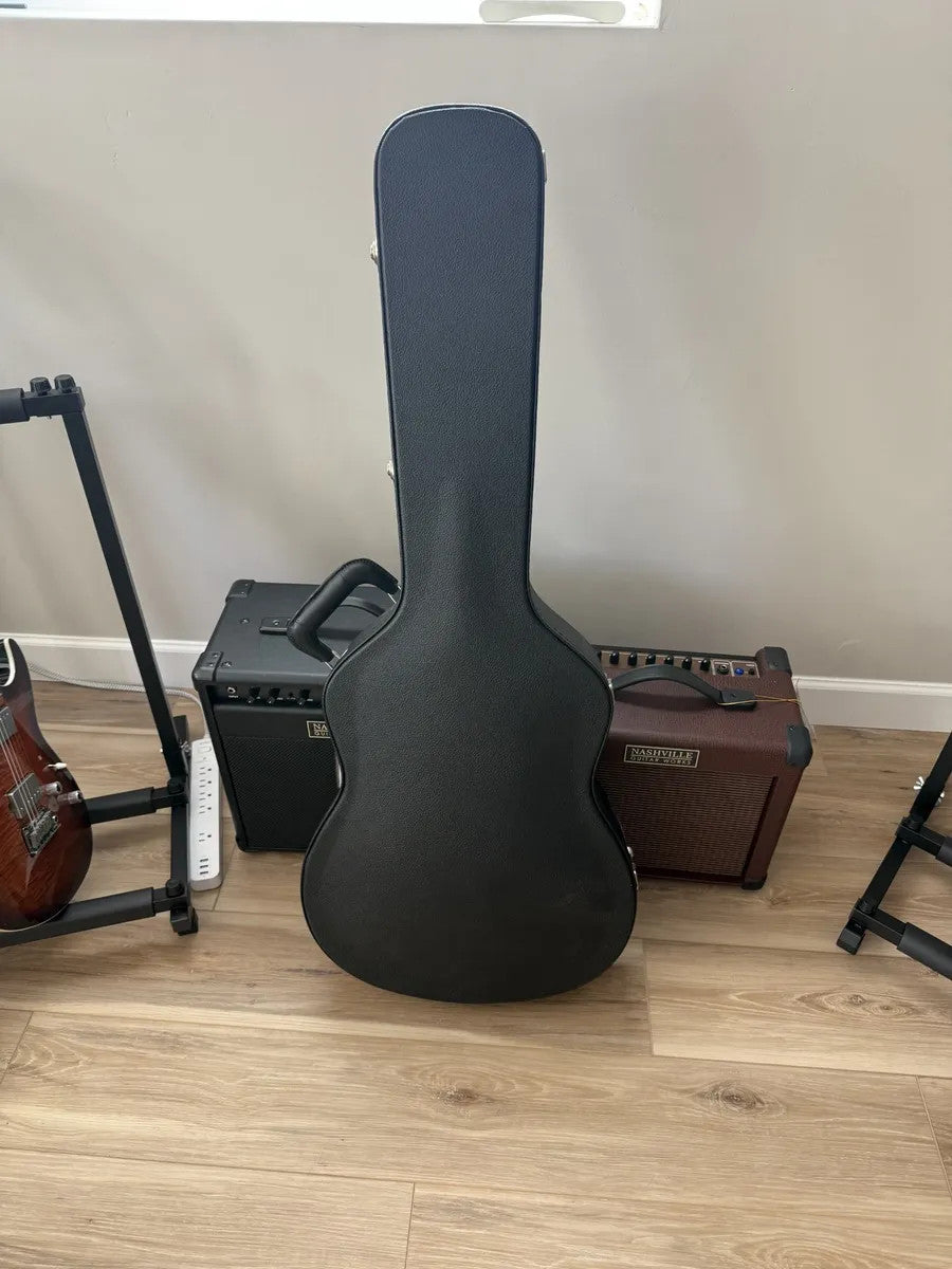 Used Alvarez hollow body electric guitar hardshell case with black exterior and plush interior for protection.