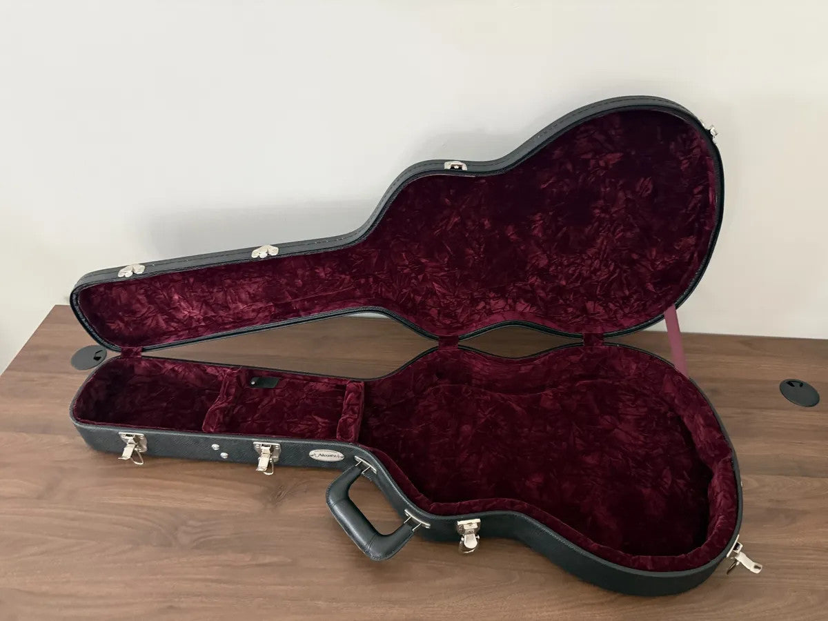 Used Alvarez hollow body electric guitar hardshell case with sturdy exterior and plush interior for protection.