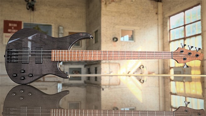 Cerberus Colossus Bass IV in black, showcasing its sleek design and detailed craftsmanship.