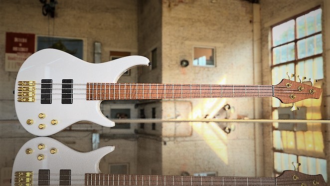 Cerberus Colossus Bass IV in white, showcasing sleek body design and detailed hardware features.