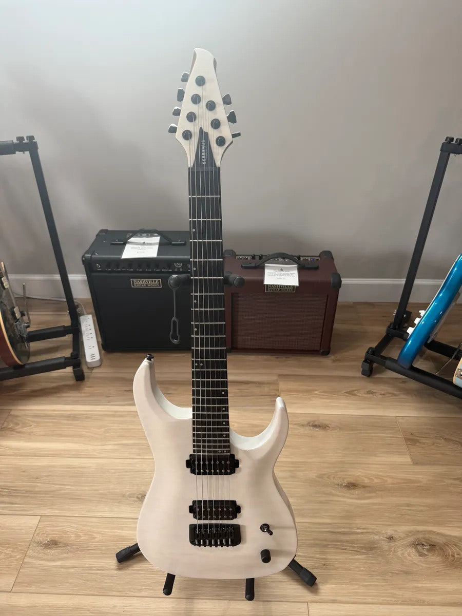 Cerberus Guitars Atlas 7 String in Olympian White, showcasing sleek design and detailed craftsmanship.