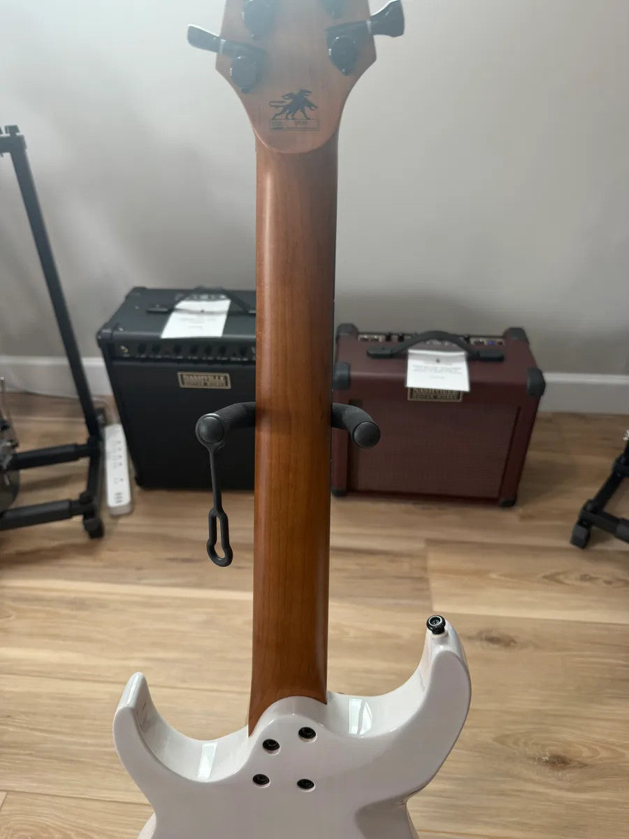 Cerberus Guitars Atlas 7 String in Olympian White with sleek body and elegant design, showcasing its unique features.