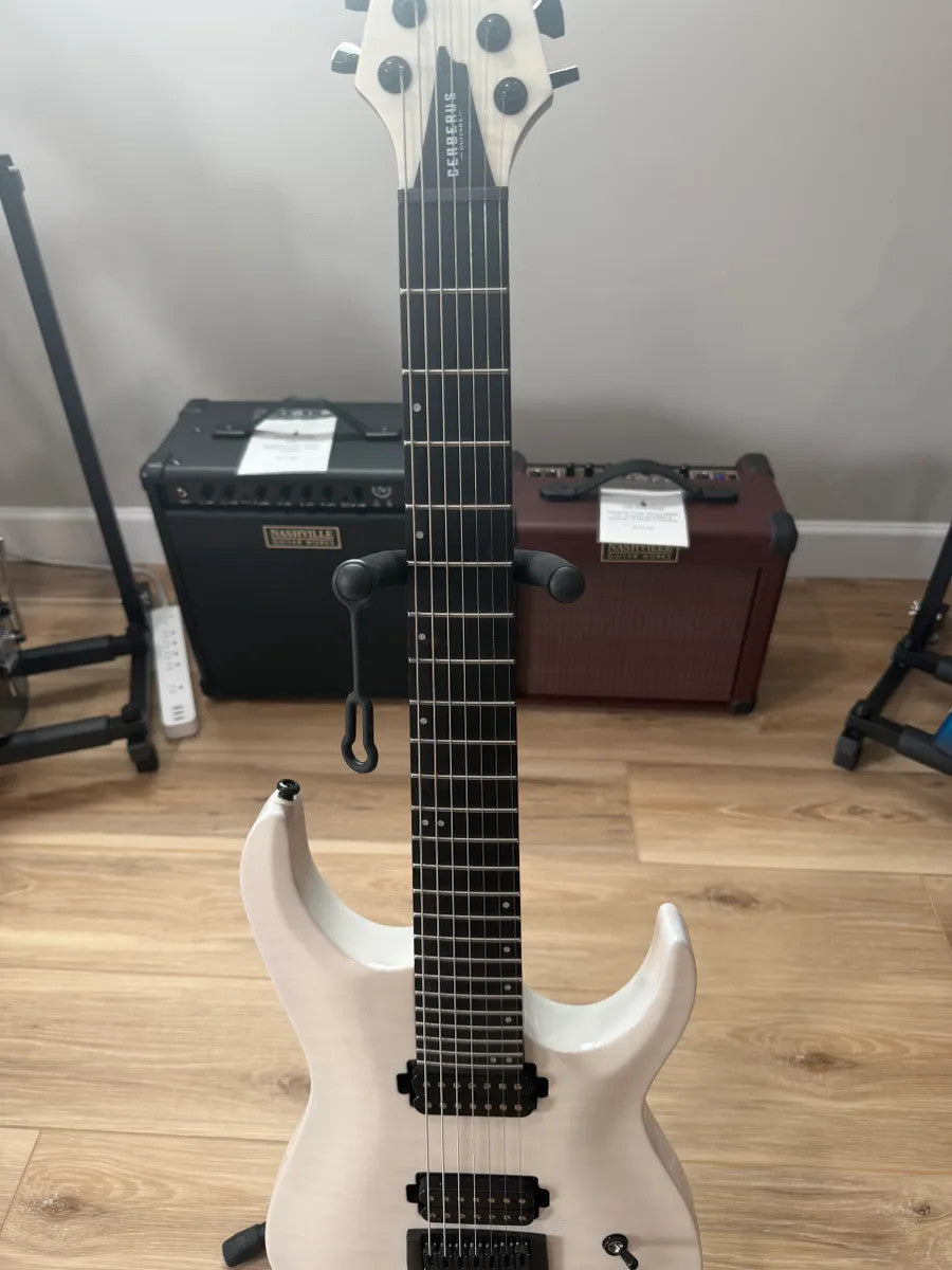 Cerberus Guitars Atlas 7 String in Olympian White with sleek design and detailed craftsmanship.