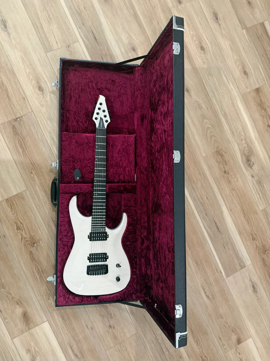 Cerberus Atlas 7 String guitar in Olympian White, showcasing sleek body design and seven-string configuration.