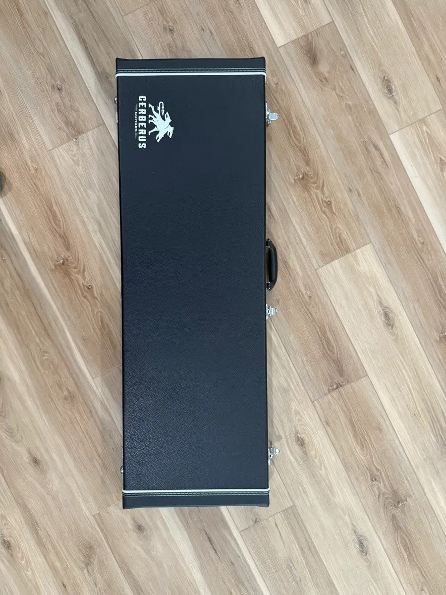 Cerberus Atlas 7-string guitar in Olympian White with sleek body design and modern hardware details.