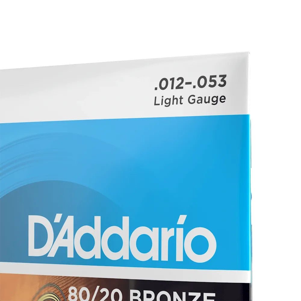 D'Addario EJ11 80/20 bronze acoustic guitar strings in light gauge 12-53, displayed on a wooden surface.
