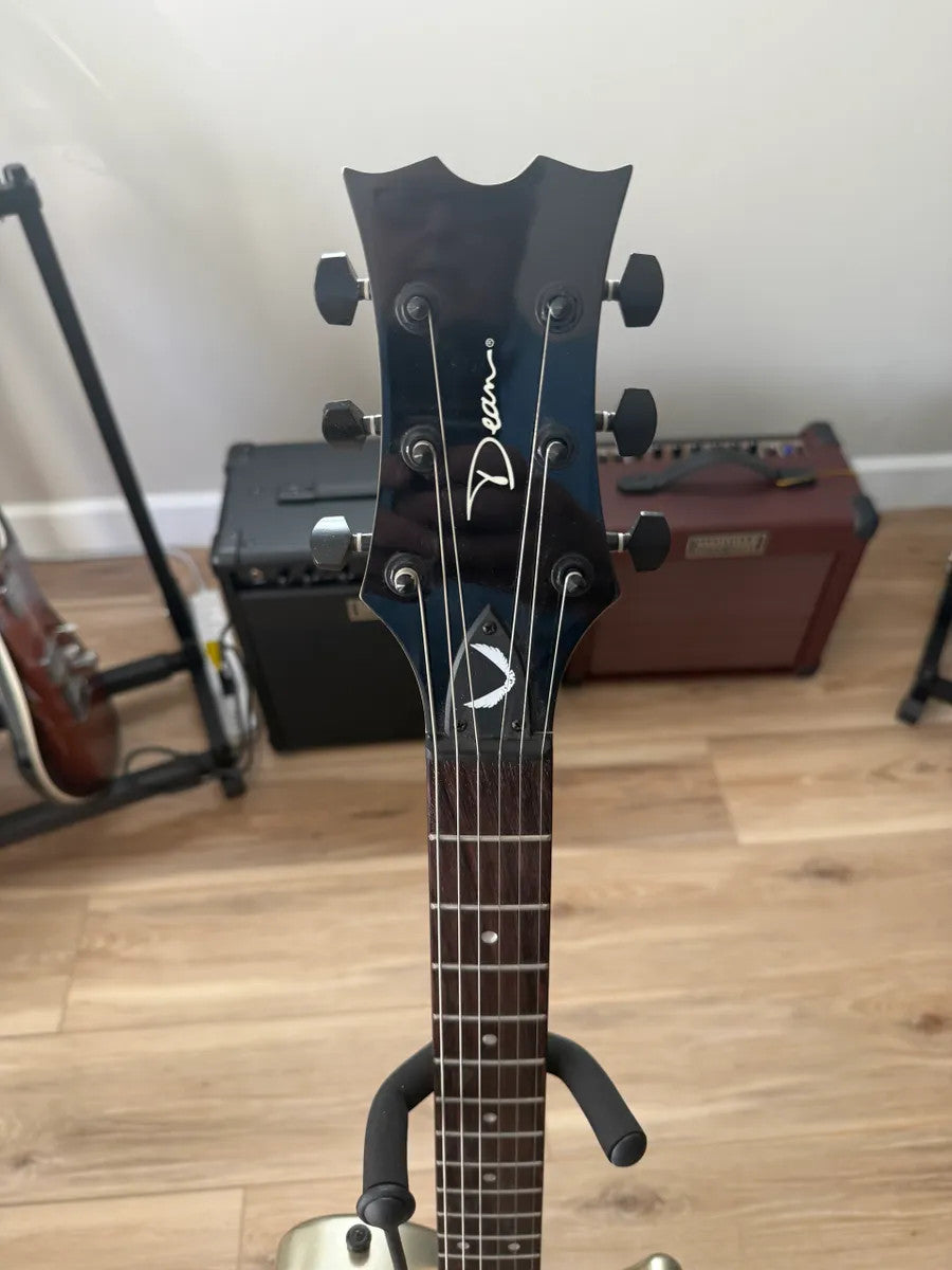 Used Dean Guitars EVO XM MSL solid body electric guitar in metallic silver with dual humbuckers.