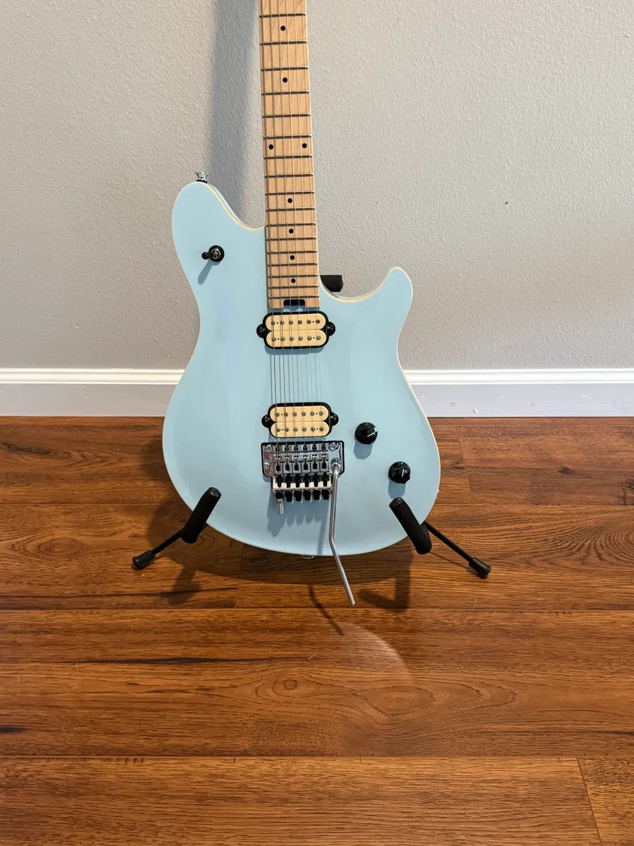 Used EVH Wolfgang Special in Sonic Boom finish, showcasing vibrant colors and sleek design with distinctive body shape.