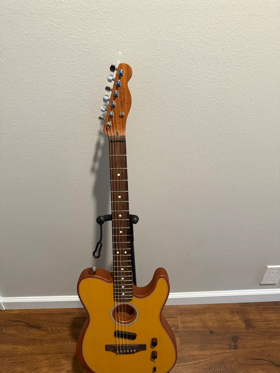 Used Fender Acoustasonic Telecaster in Butterscotch Blonde with a sleek body and classic Telecaster design.