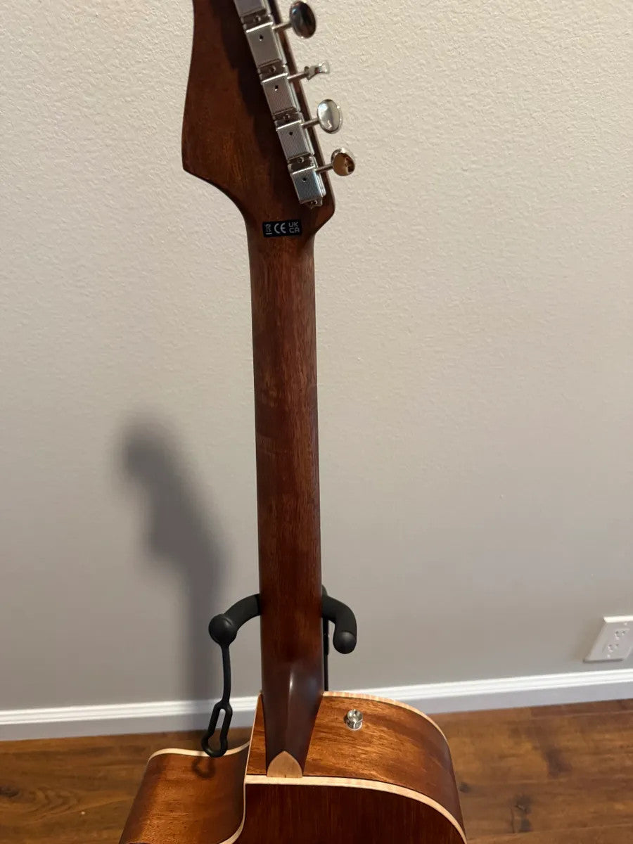 Used Fender Newporter Special Acoustic Electric Guitar in great condition with case, showcasing its elegant design and color.