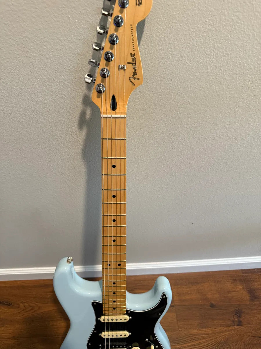 Used Fender Player Stratocaster HSS in Sonic Blue, showcasing solid body and sleek design features.