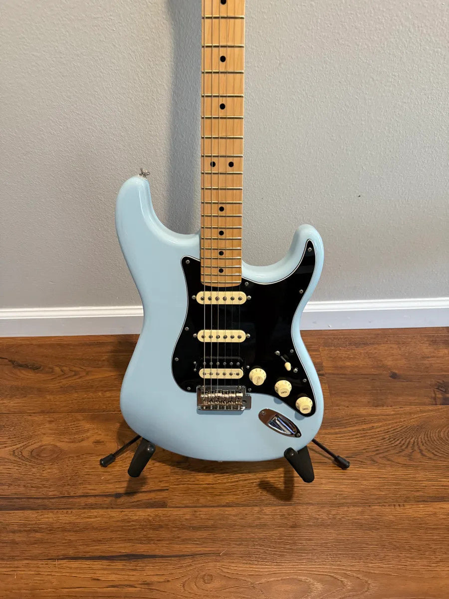 Used Fender Player Stratocaster HSS in Sonic Blue, solid body electric guitar with a sleek design and classic features.