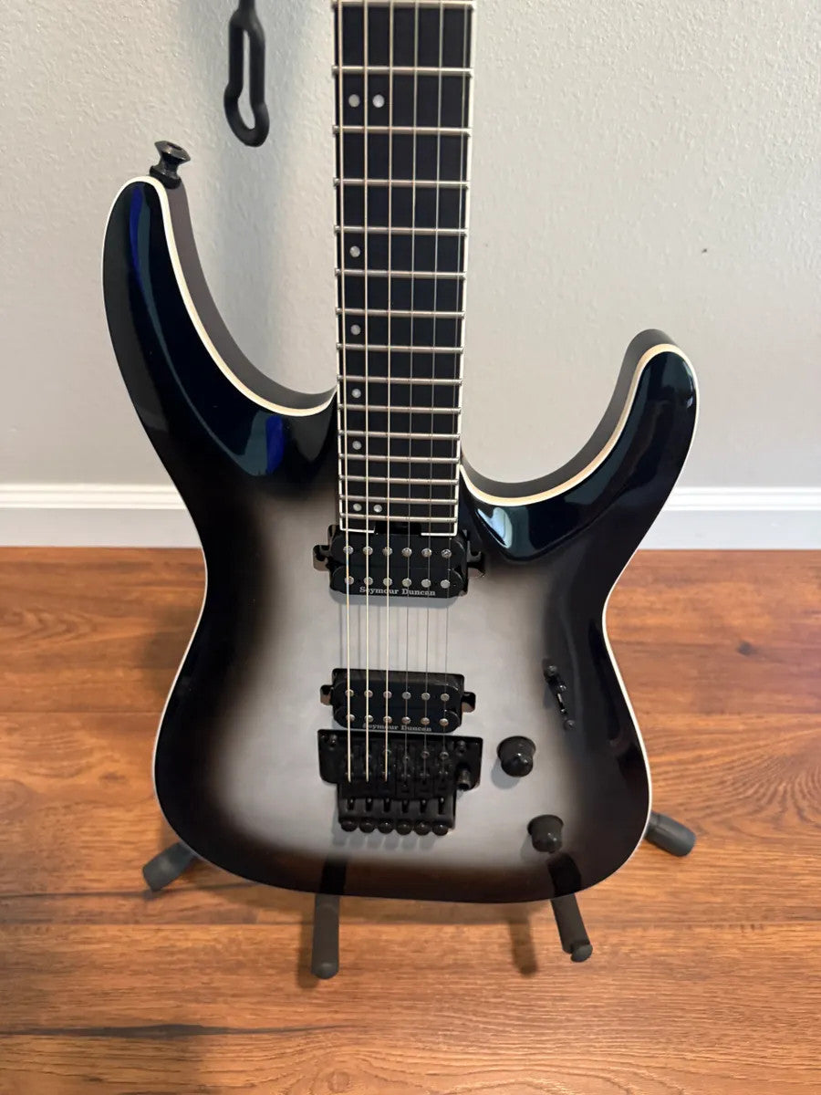 Used Jackson Pro Plus Series Dinky DKAQ guitar in Ghost Burst finish, showcasing its sleek design and vibrant color.