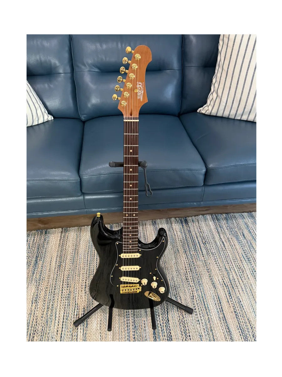 Jet Guitars JS-380 BK G electric guitar with a sleek black finish and stylish design.