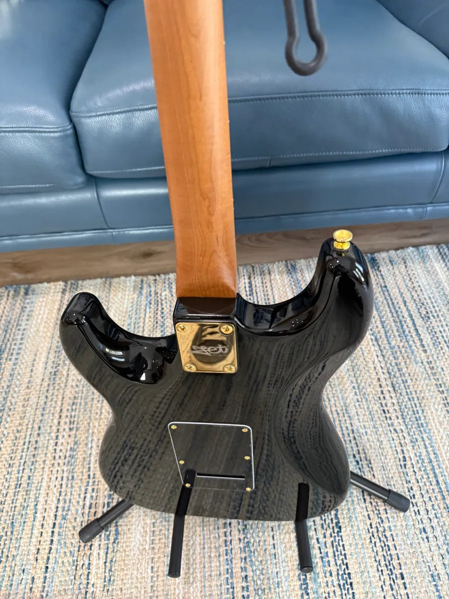 Jet Guitars JS-380 BK G electric guitar with a sleek black finish and classic body shape.