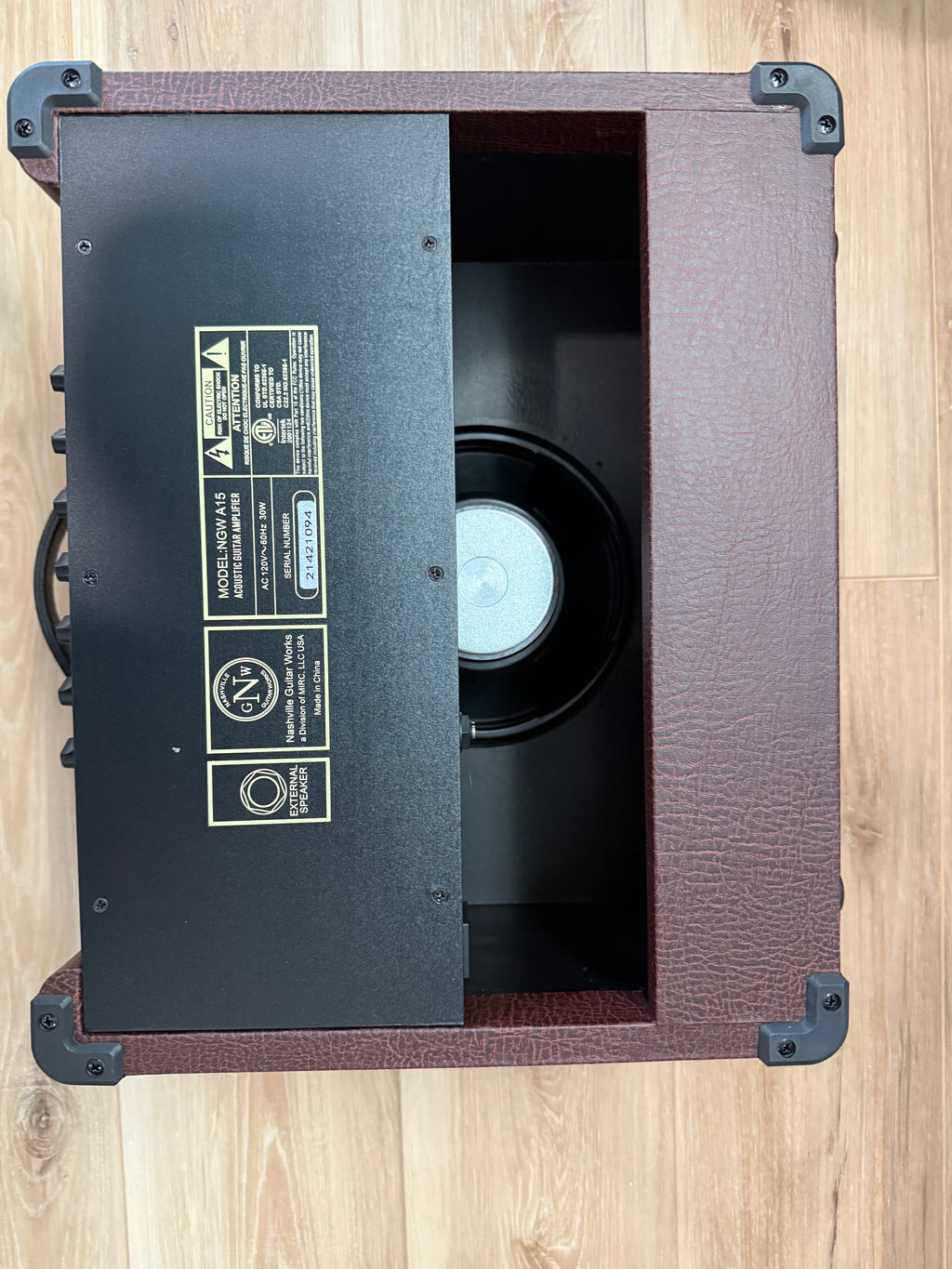 Palm Harbor Music NGW A15 Acoustic Amplifier with 8" speaker and dual channels, showcasing sleek design and controls.