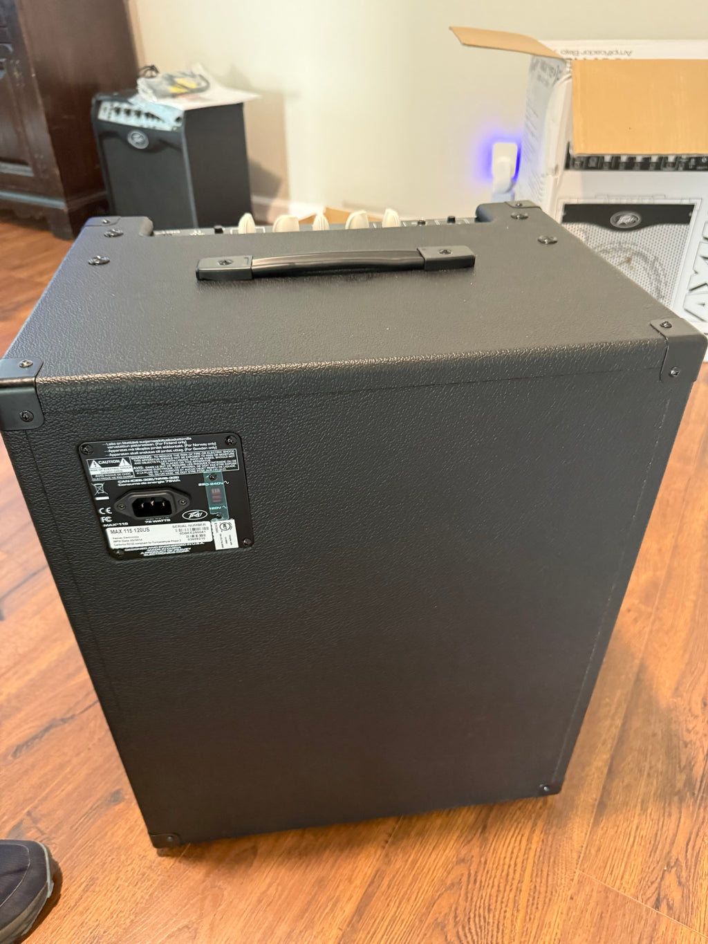 Peavey Max 115 bass combo amp with 1x15 speaker displayed in a sleek, modern design on a neutral background.