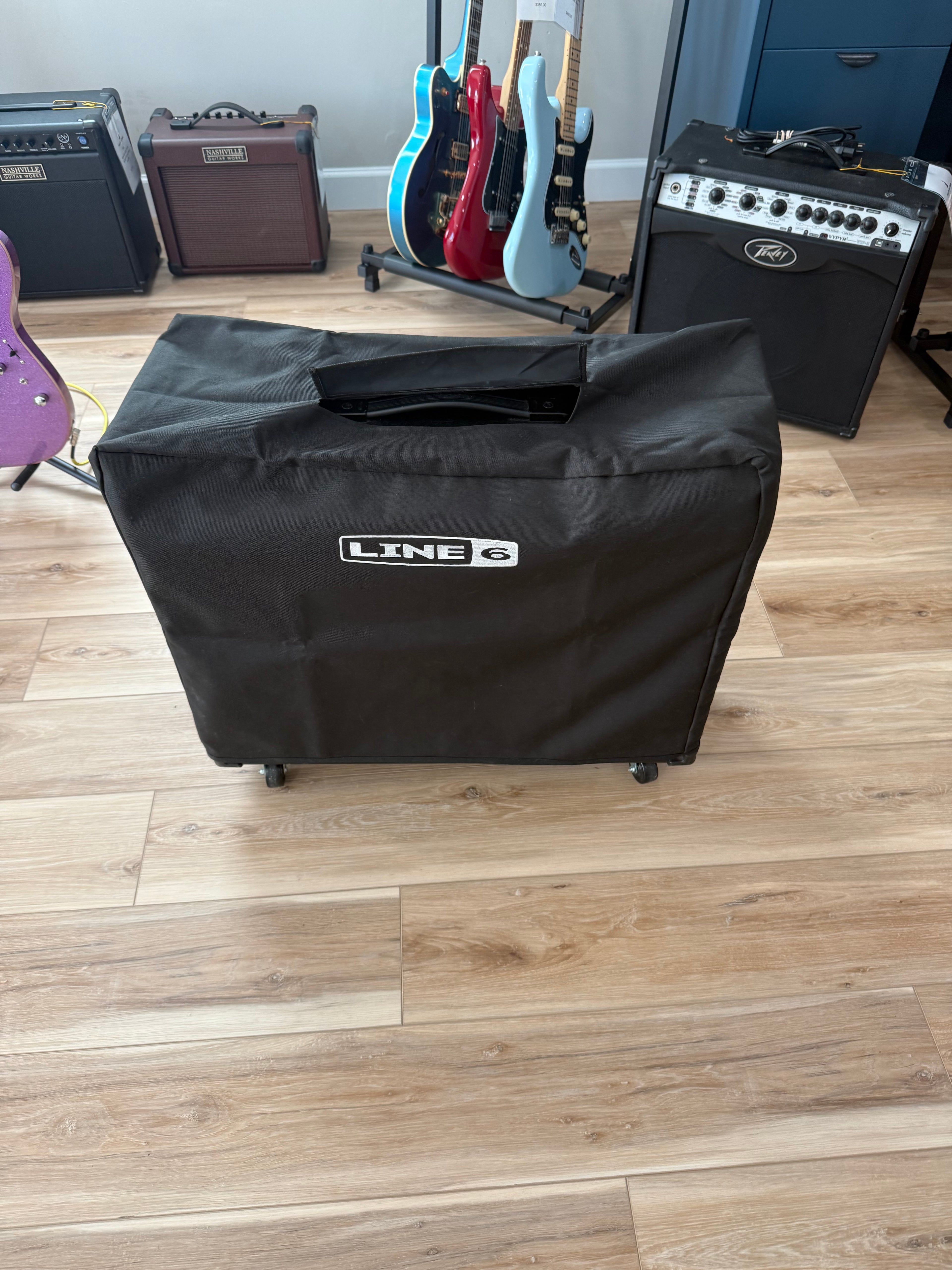 Used Line 6 Spider III 150W stereo guitar amplifier with dual 12-inch speakers in a classic design.