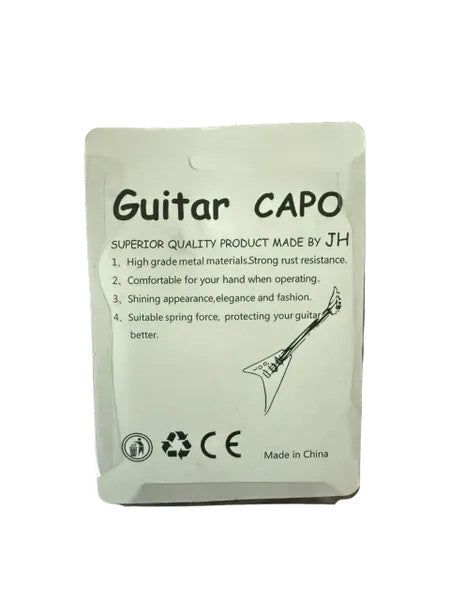 Black capo for guitars, featuring a sleek design and sturdy grip, ideal for musicians and guitar enthusiasts.