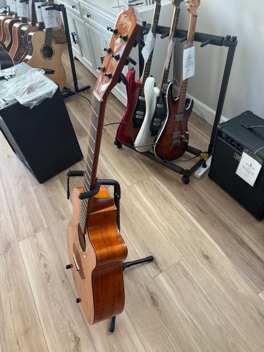 Used Washburn Comfort Series WCG66SCE acoustic electric guitar with a natural finish and cutaway body design.