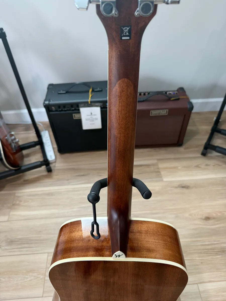 Used Washburn HD10S Heritage acoustic guitar with a natural wood finish and classic shape on a neutral background.
