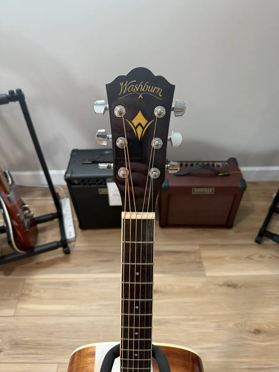 Used Washburn HD10S Heritage Acoustic Guitar with a classic body shape and natural wood finish.