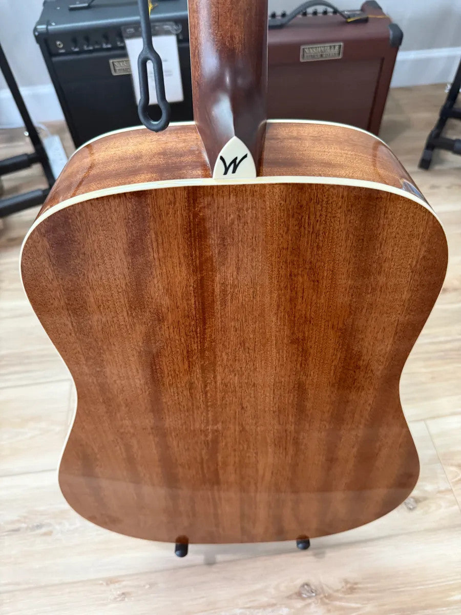 Used Washburn HD10S Heritage Acoustic Guitar with a natural wood finish and classic design, showcasing its body and neck.