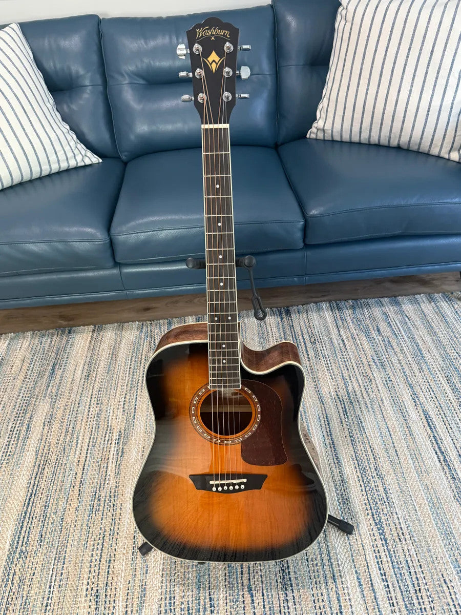 Used Washburn HD10SCETB Heritage Series acoustic guitar with a cutaway design and a rich, sunburst finish.