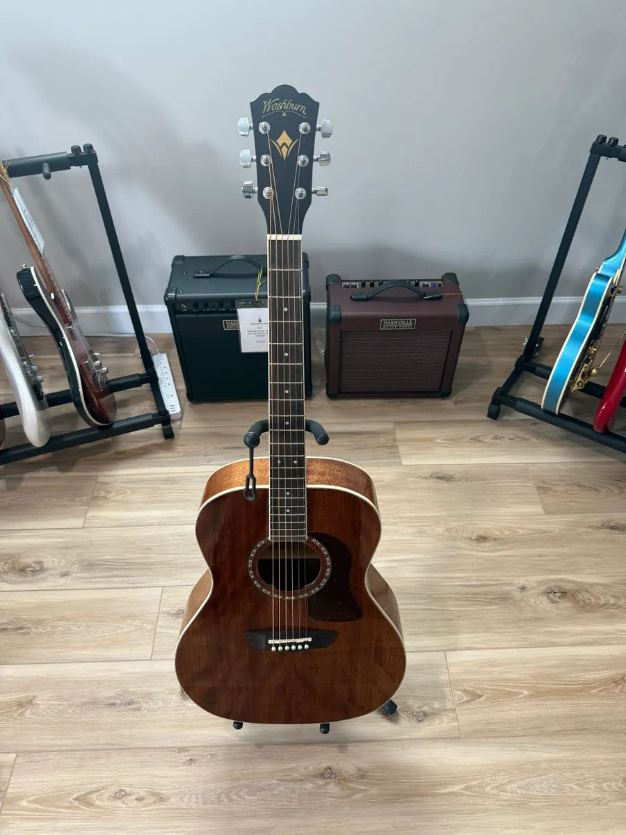 Used Washburn HG12SO WEK Heritage Acoustic Guitar with a natural finish and intricate wood grain details.