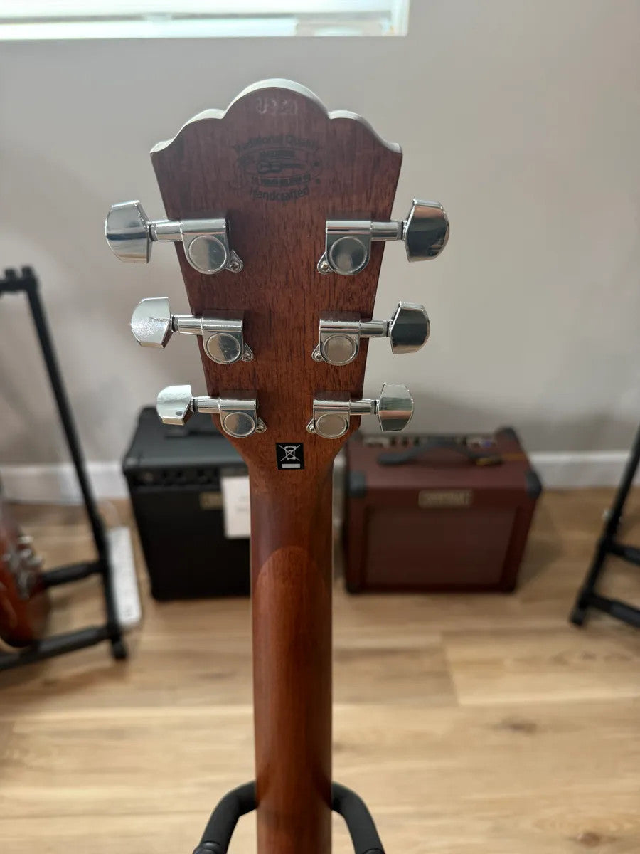 Used Washburn HG12SO WEK Heritage Acoustic Guitar with a natural finish and classic body shape.