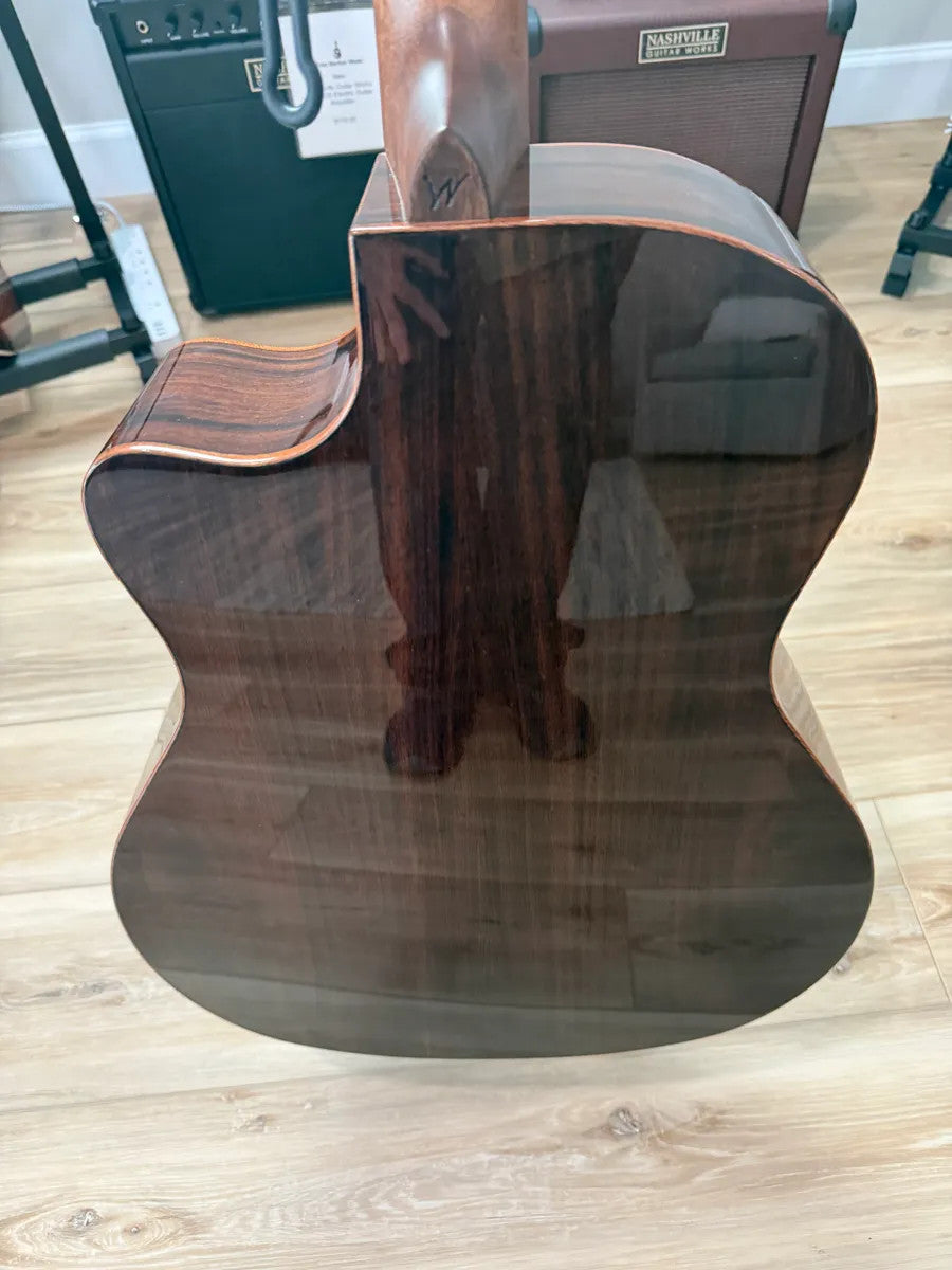 Used Washburn WCG20SCE Comfort Acoustic Electric Guitar with a natural wood finish and cutaway design.