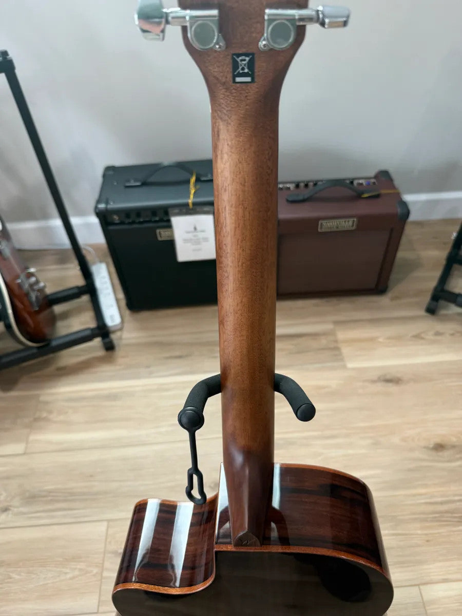 Used Washburn WCG20SCE Comfort Acoustic Electric Guitar with a natural wood finish and classic shape.